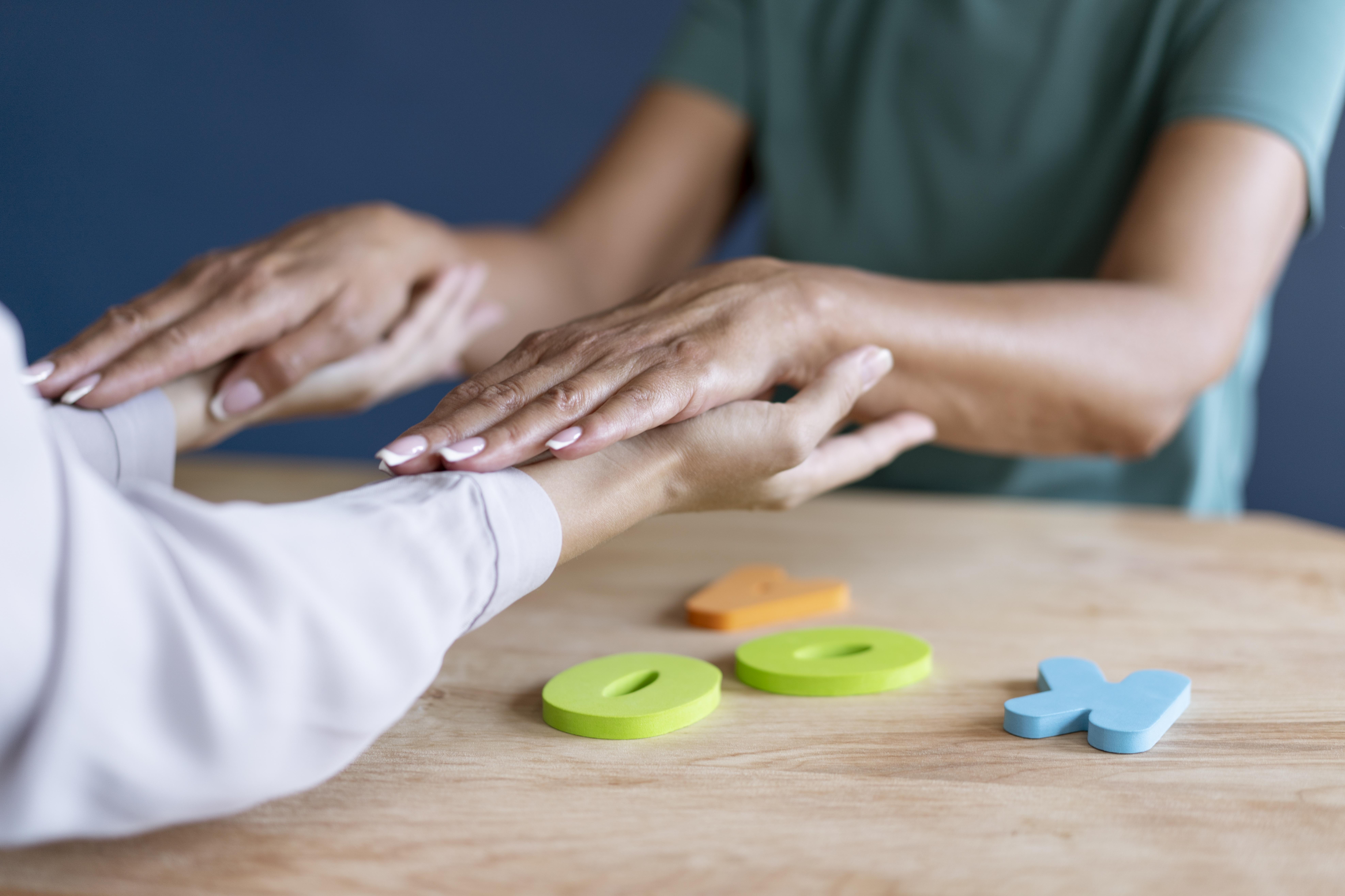 Occupational Therapist supporting a client with daily activities